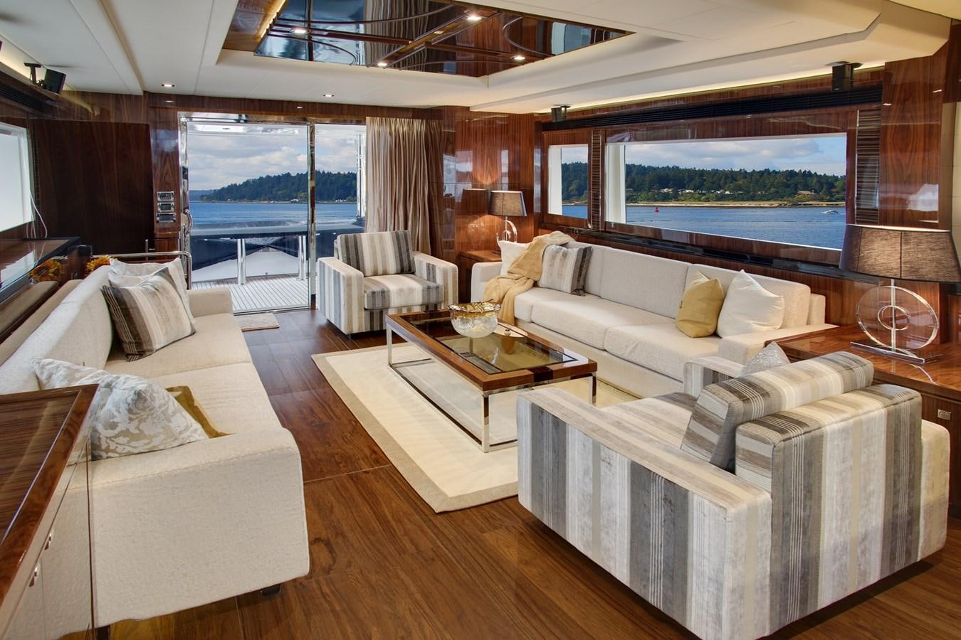 a living room with a large window aboard  V80 (NEW BOAT SPEC)  Yacht for Sale