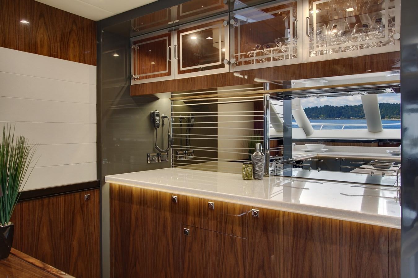 a kitchen with a sink and cabinets aboard  V80 (NEW BOAT SPEC)  Yacht for Sale