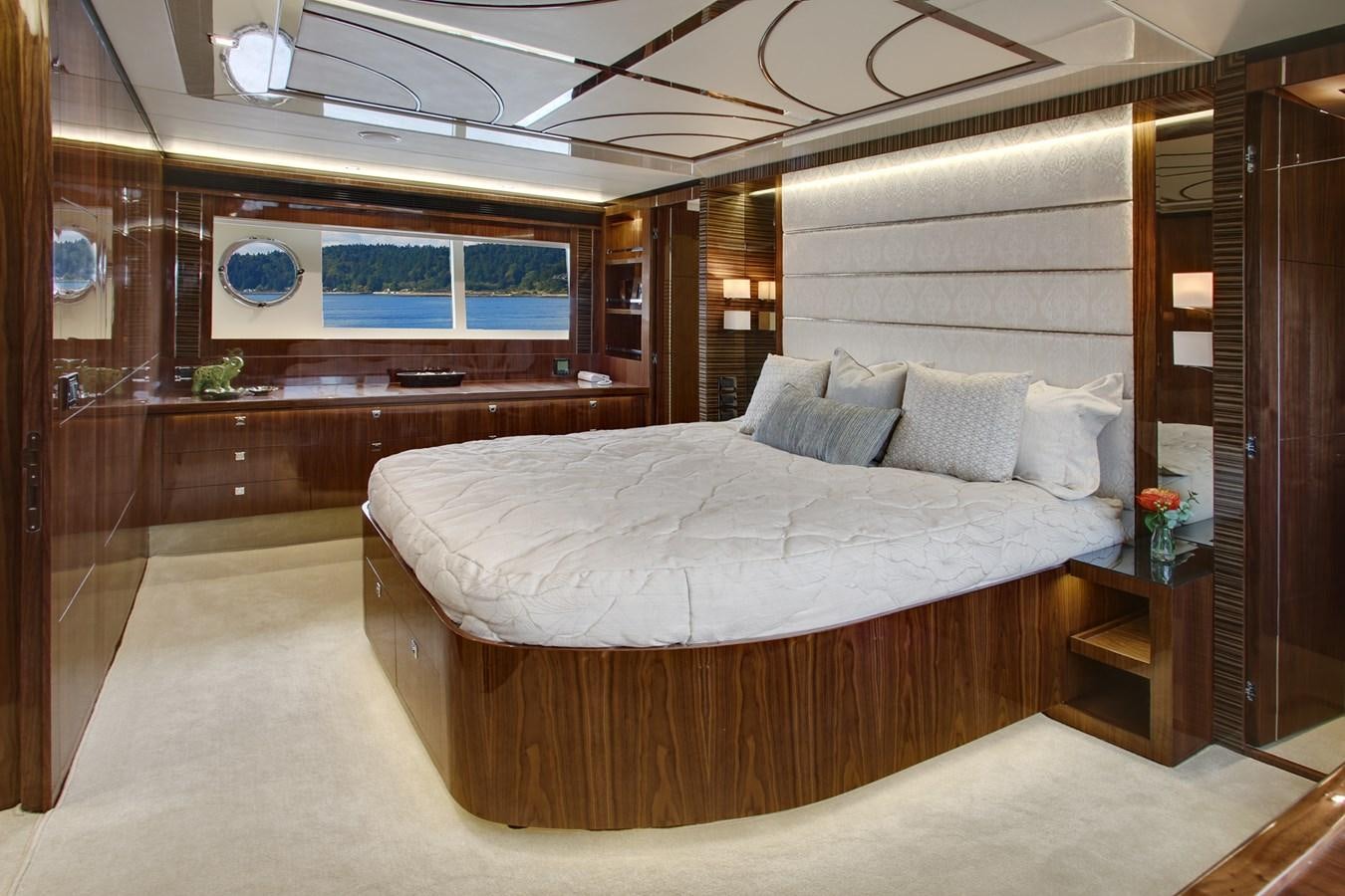 a large bed in a room aboard  V80 (NEW BOAT SPEC)  Yacht for Sale