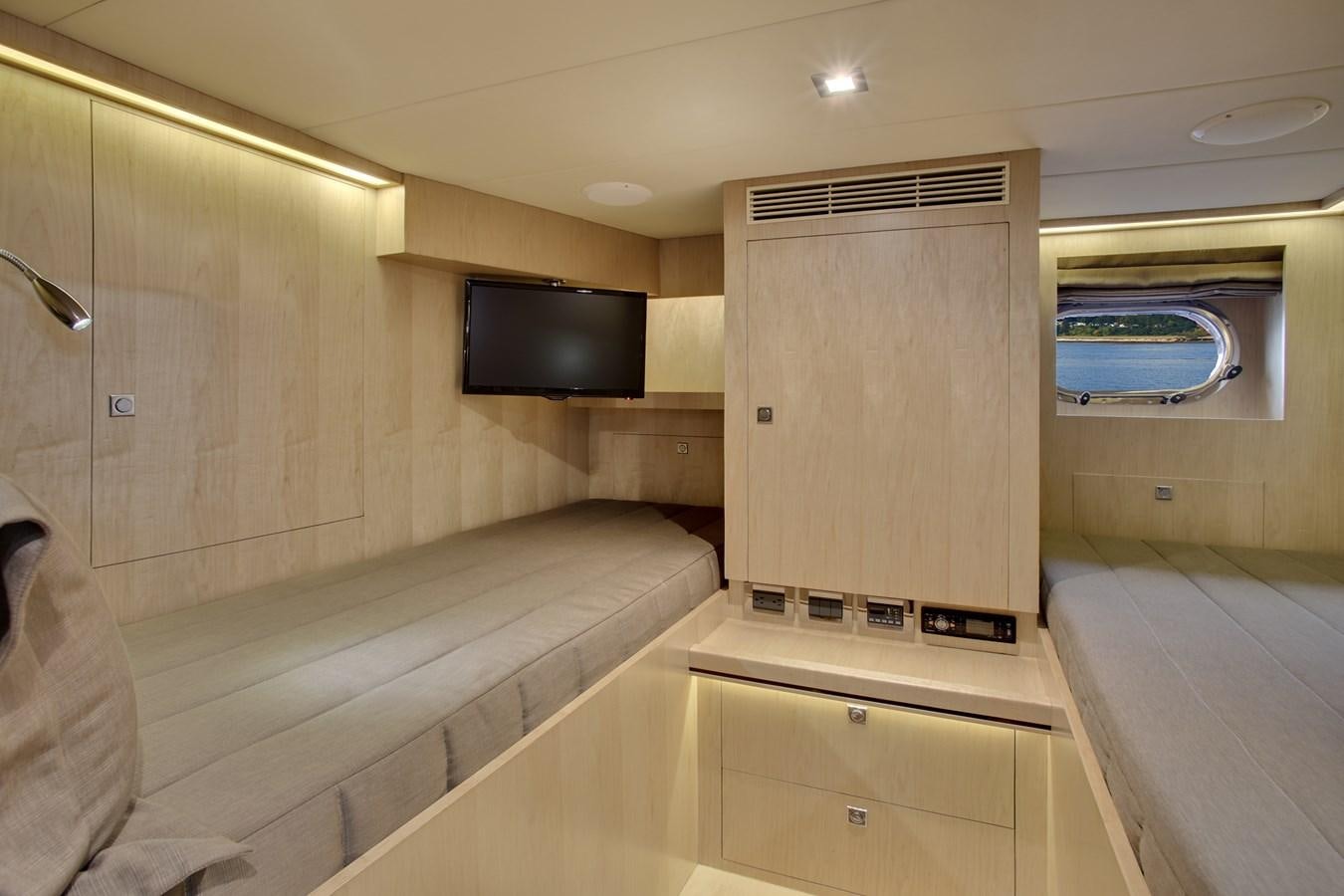 a room with a tv and a bed aboard  V80 (NEW BOAT SPEC)  Yacht for Sale