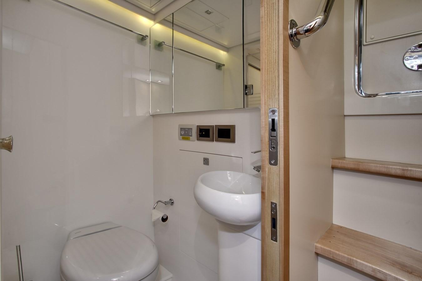 a bathroom with a toilet and sink aboard  V80 (NEW BOAT SPEC)  Yacht for Sale