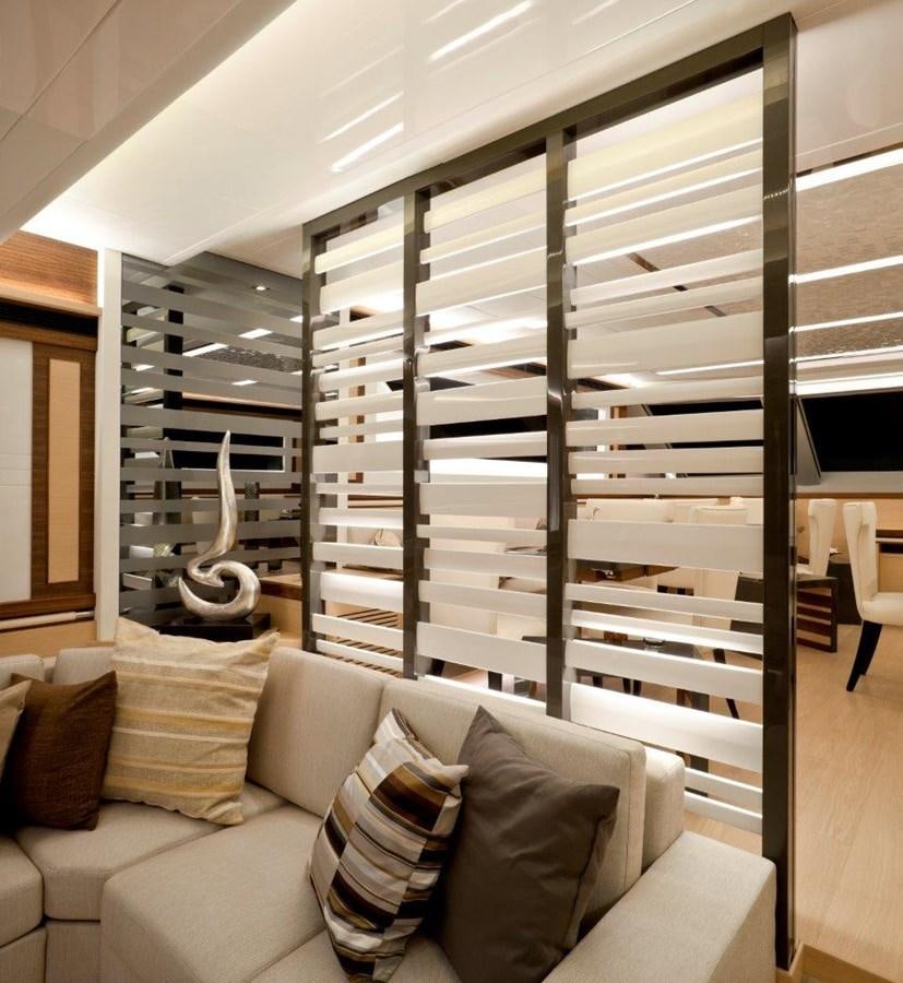 a room with a couch and a coffee table aboard  V80 (NEW BOAT SPEC)  Yacht for Sale