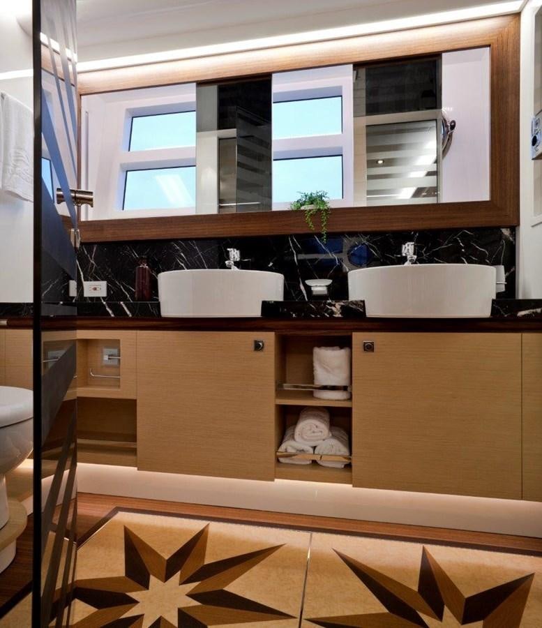 a room with a shelf and a window aboard  V80 (NEW BOAT SPEC)  Yacht for Sale