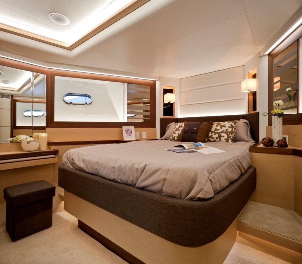 a bedroom with a bed and a mirror aboard  V80 (NEW BOAT SPEC)  Yacht for Sale