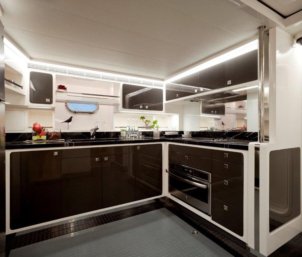 a kitchen with a large window aboard  V80 (NEW BOAT SPEC)  Yacht for Sale