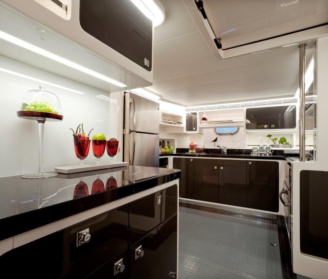 a kitchen with white cabinets aboard  V80 (NEW BOAT SPEC)  Yacht for Sale