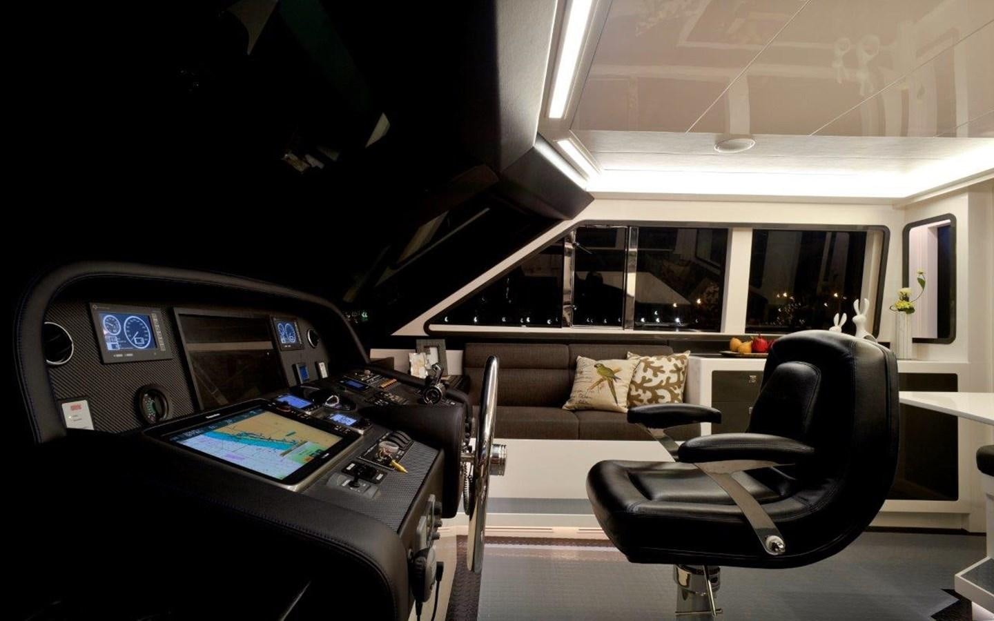 a black leather chair in a room aboard  V80 (NEW BOAT SPEC)  Yacht for Sale