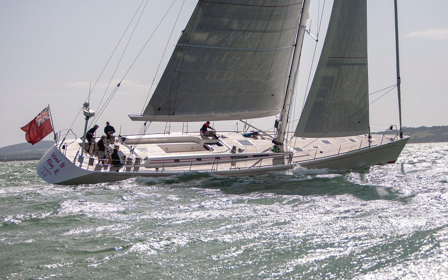 a group of people sailing on a sailboat aboard ISLAND FLING Yacht for Sale