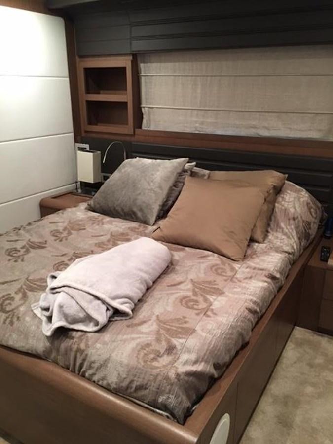 a bed with pillows aboard COLUMBUS A Yacht for Sale