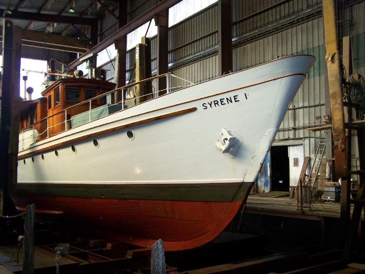 a boat in a warehouse aboard SYRENE I Yacht for Sale