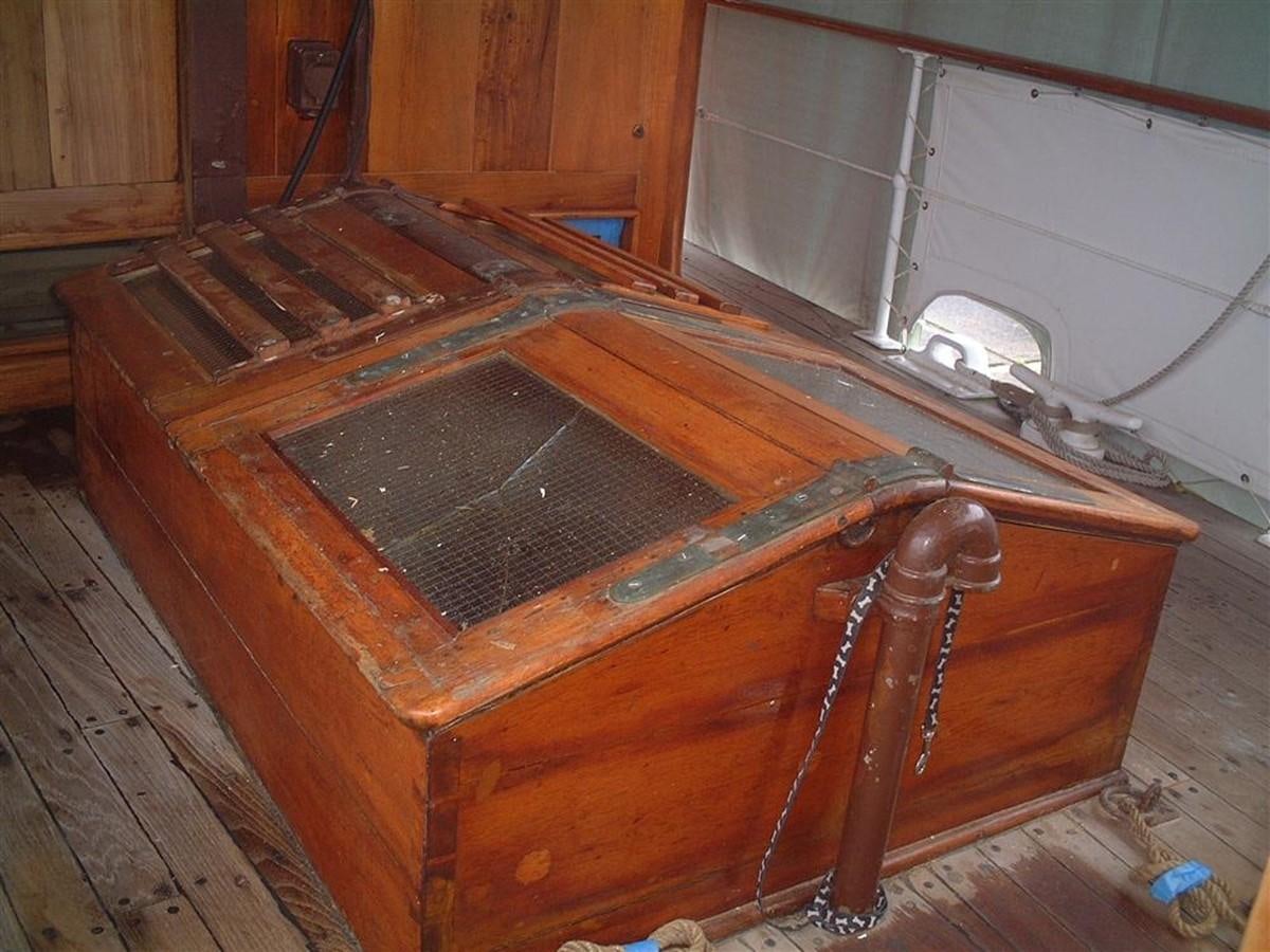 a wooden box with a metal lid aboard SYRENE I Yacht for Sale