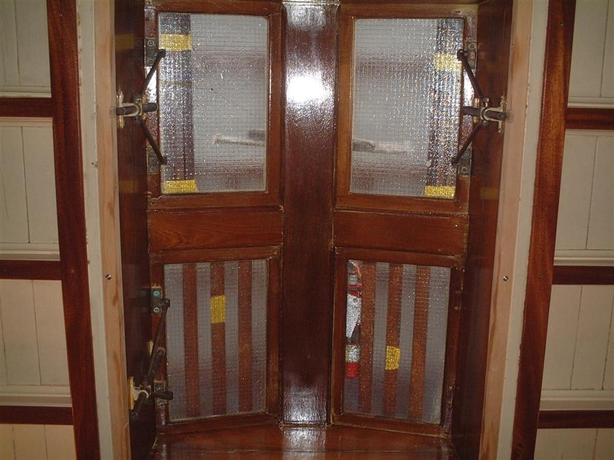 a wooden door with a metal frame aboard SYRENE I Yacht for Sale