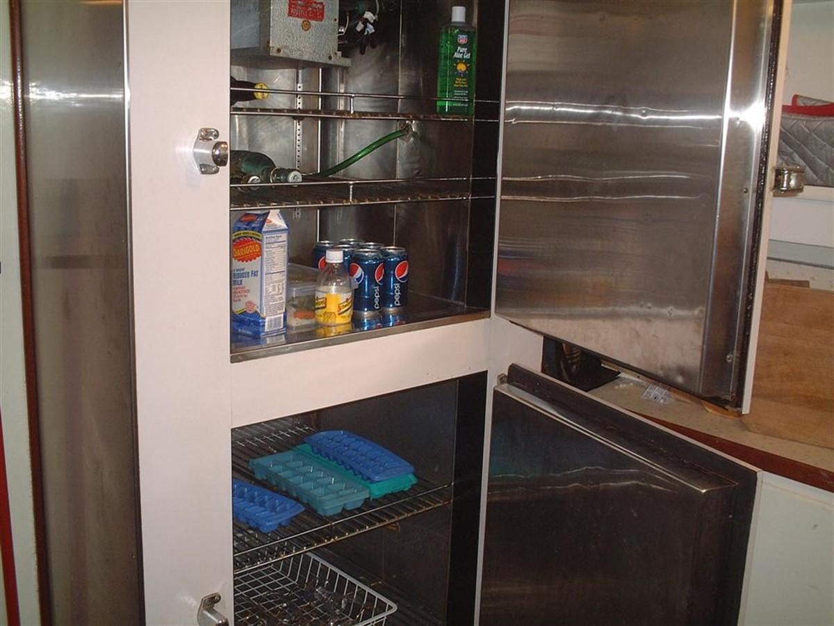a refrigerator is open aboard SYRENE I Yacht for Sale