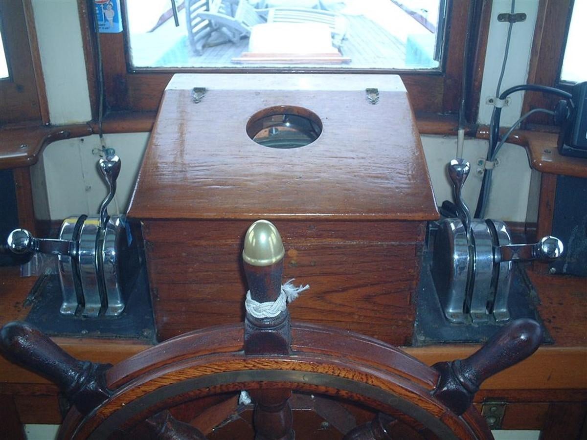 a wooden box with a screw and a screw aboard SYRENE I Yacht for Sale