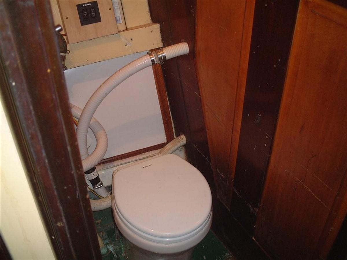 a toilet with a sink aboard SYRENE I Yacht for Sale