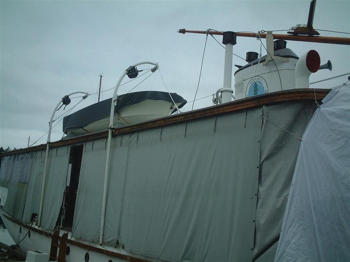 a large white boat with a large white tent aboard SYRENE I Yacht for Sale