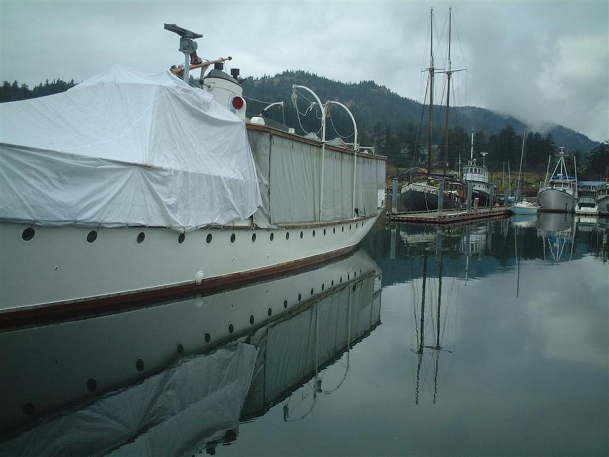 a boat docked at a pier aboard SYRENE I Yacht for Sale