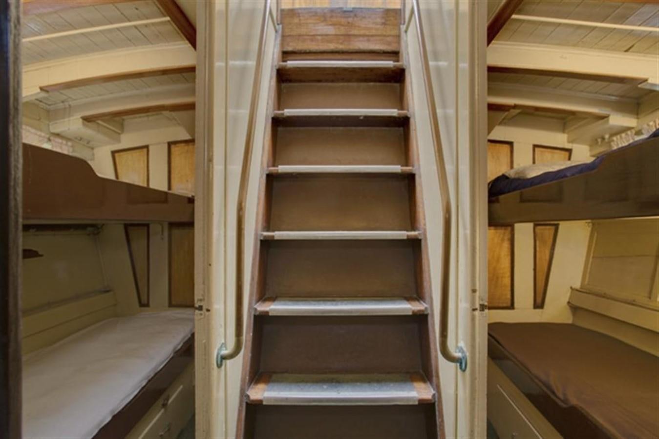 a set of wooden stairs aboard SYRENE I Yacht for Sale