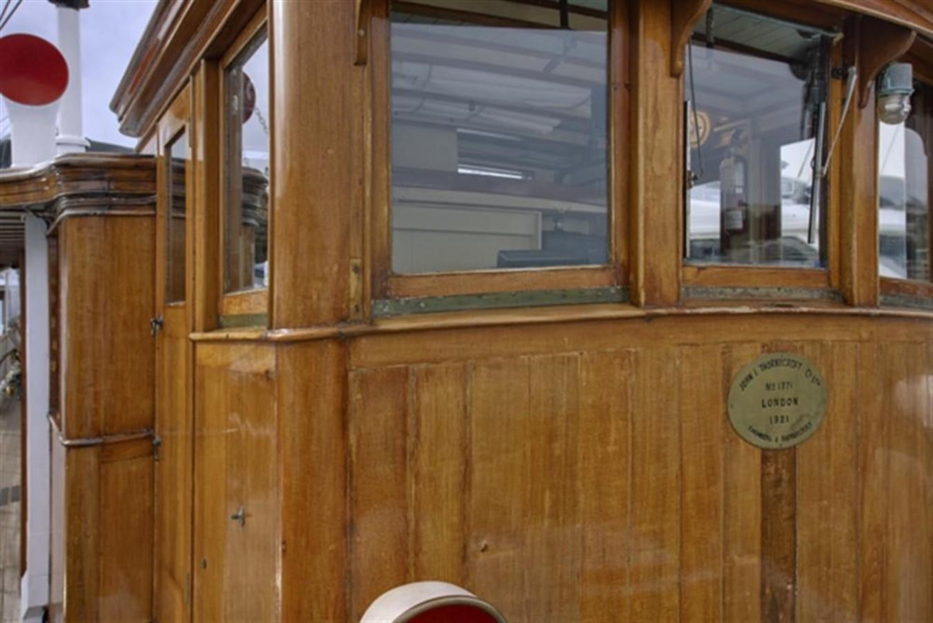 a window with a sign on it aboard SYRENE I Yacht for Sale