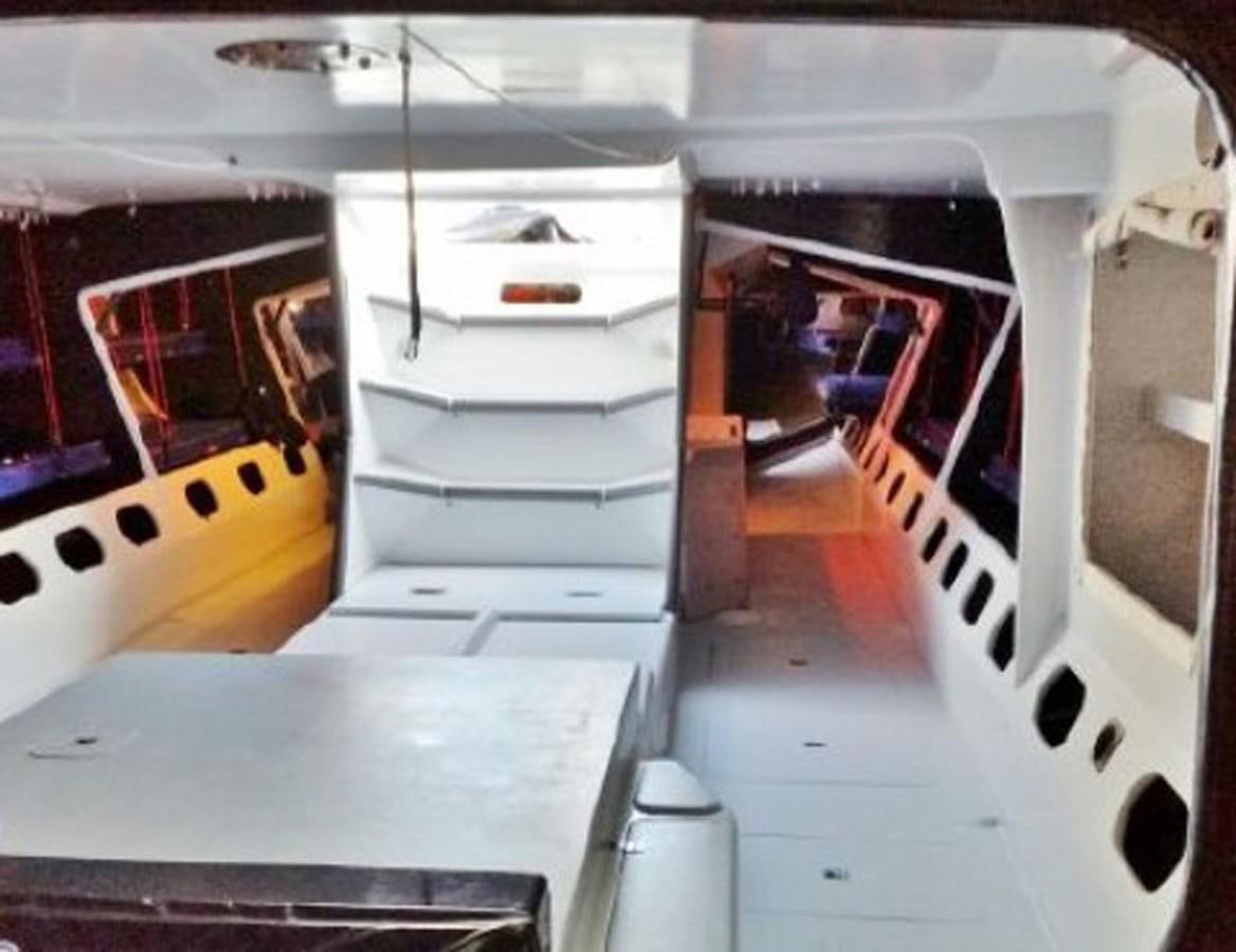 a white vehicle with black dots aboard ROTHMANS Yacht for Sale