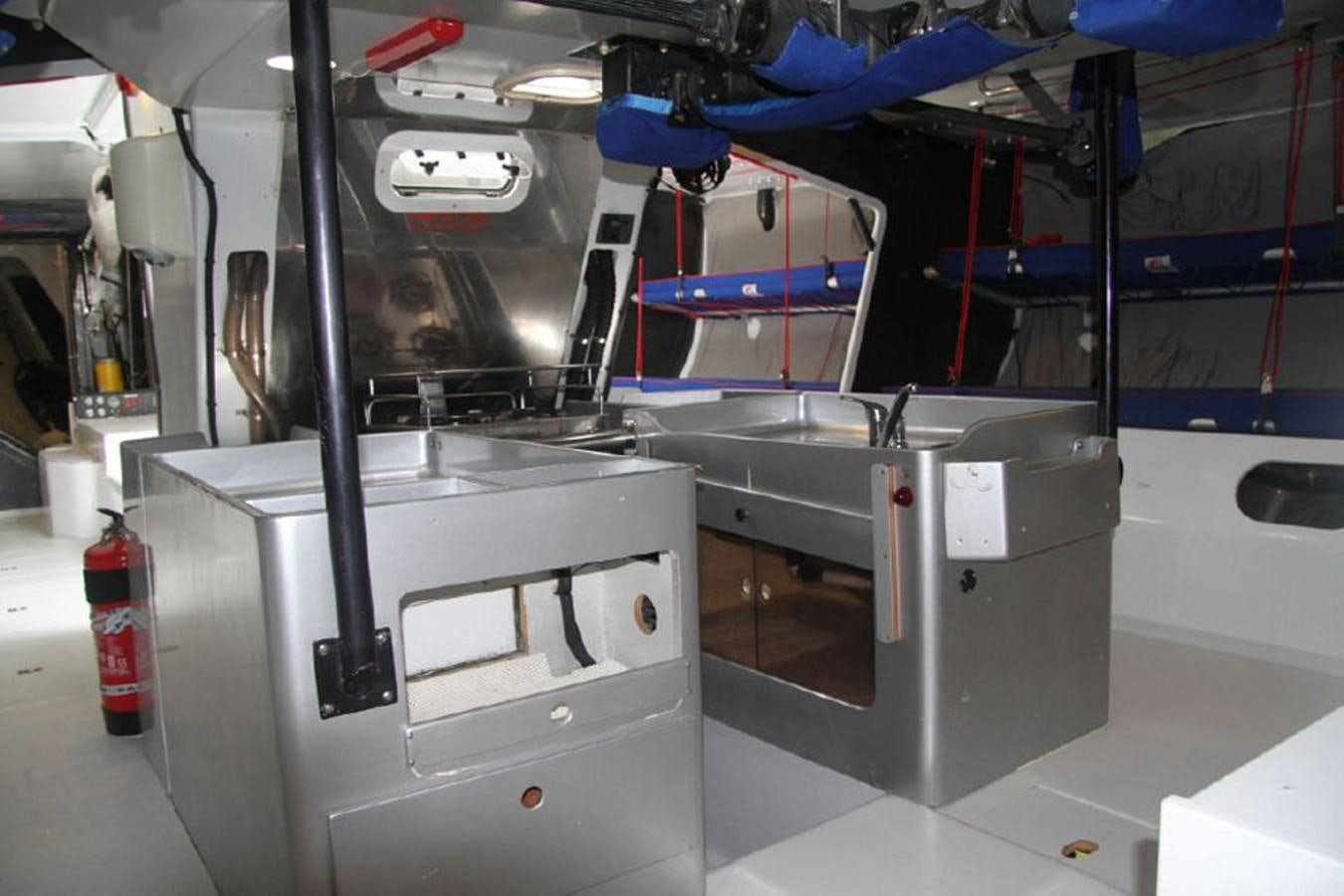 a machine in a room aboard ROTHMANS Yacht for Sale