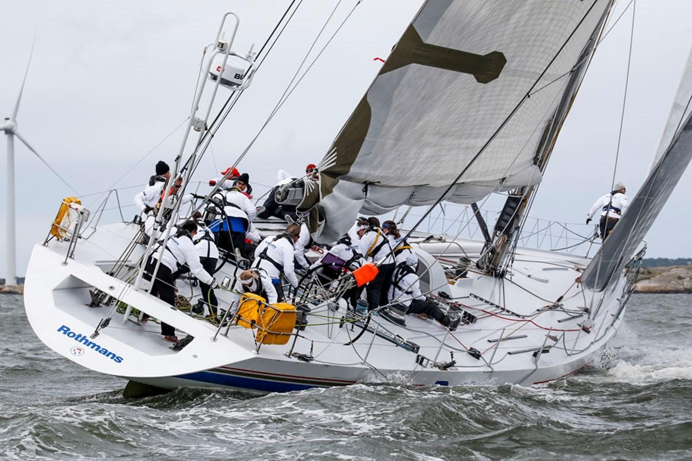 a group of people on a boat aboard ROTHMANS Yacht for Sale