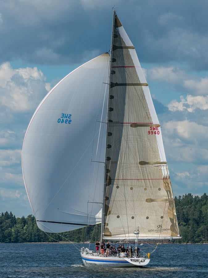 a sailboat on the water aboard ROTHMANS Yacht for Sale