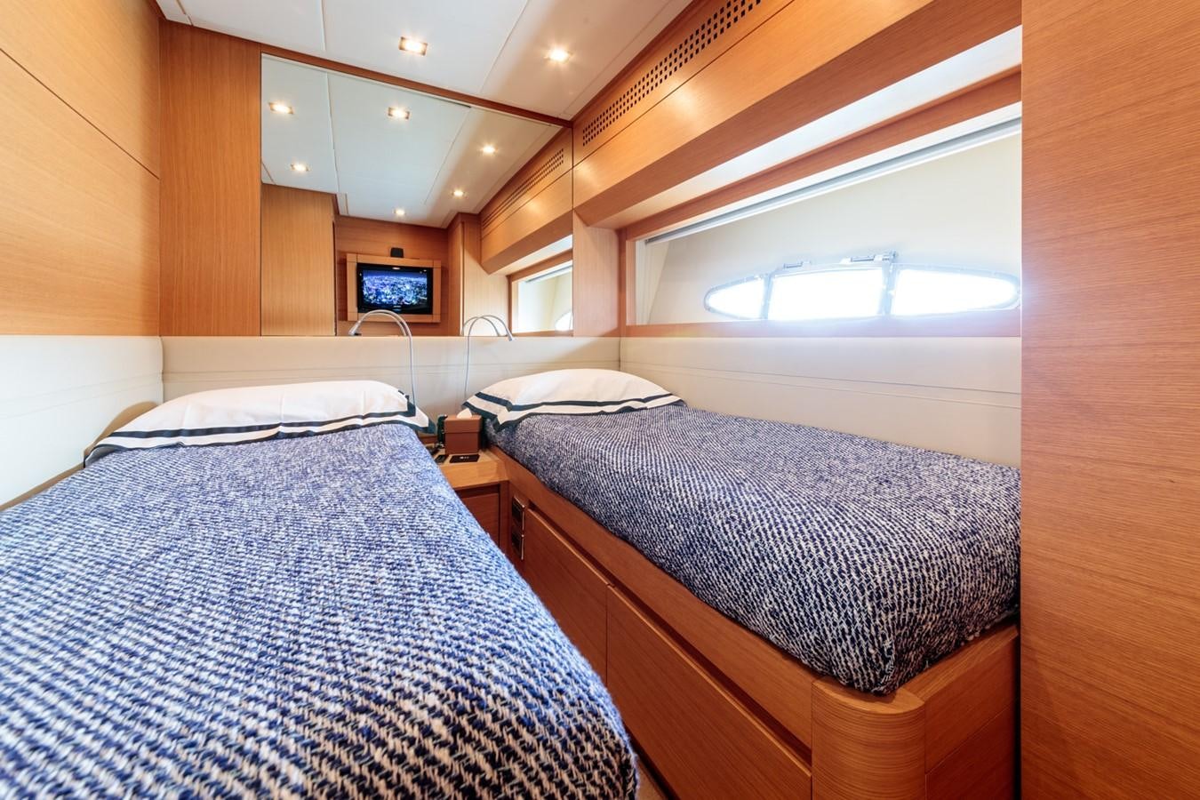 a couple of beds in a room aboard FOR EVER Yacht for Sale