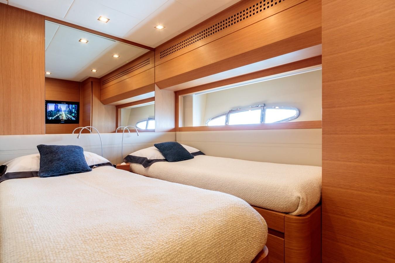 a room with two beds aboard FOR EVER Yacht for Sale