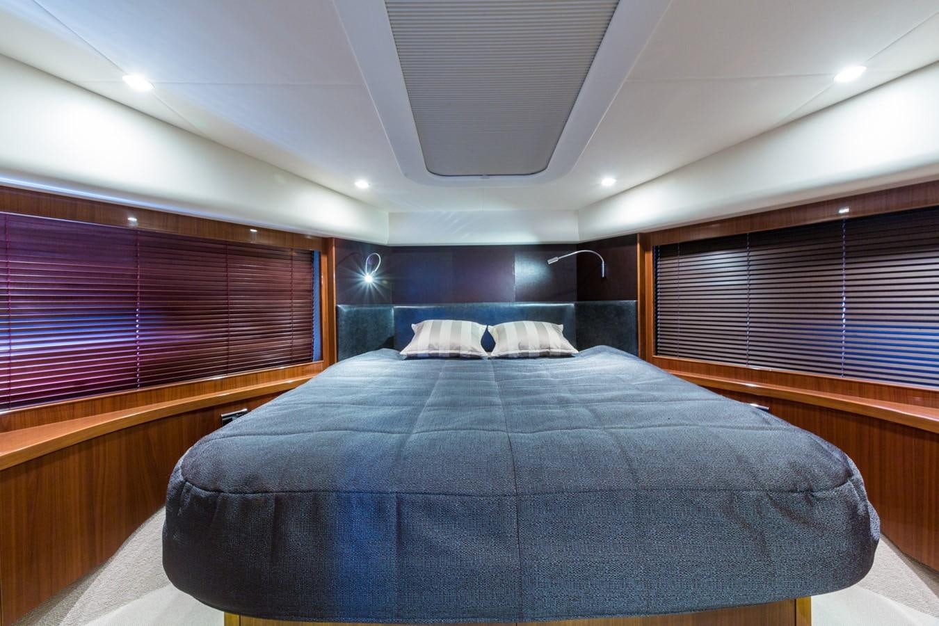 a bed in a room aboard PRINCESS 78 MY Yacht for Sale