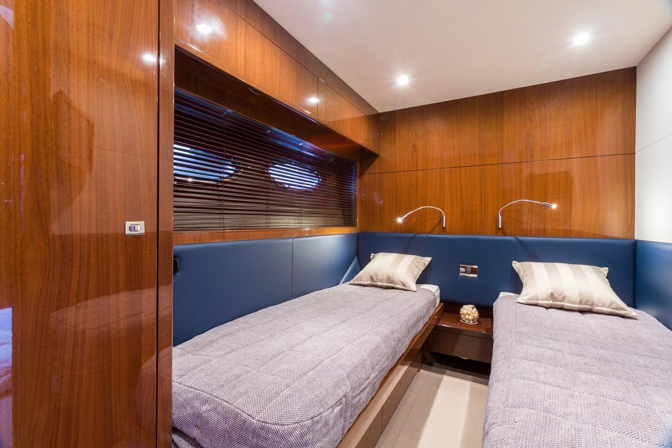 a room with two beds aboard PRINCESS 78 MY Yacht for Sale