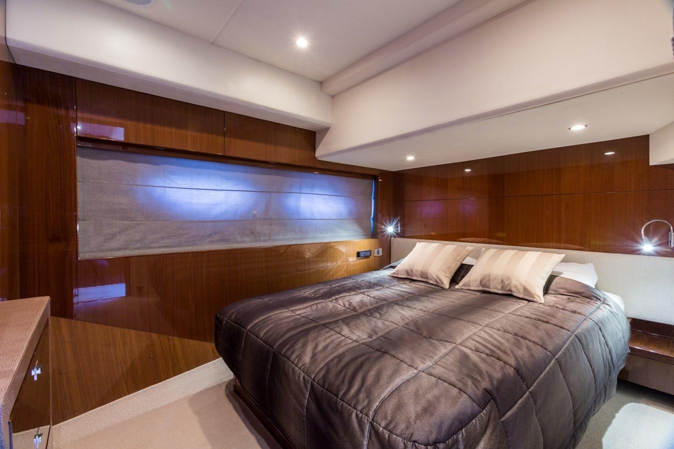 a bed in a room aboard PRINCESS 78 MY Yacht for Sale