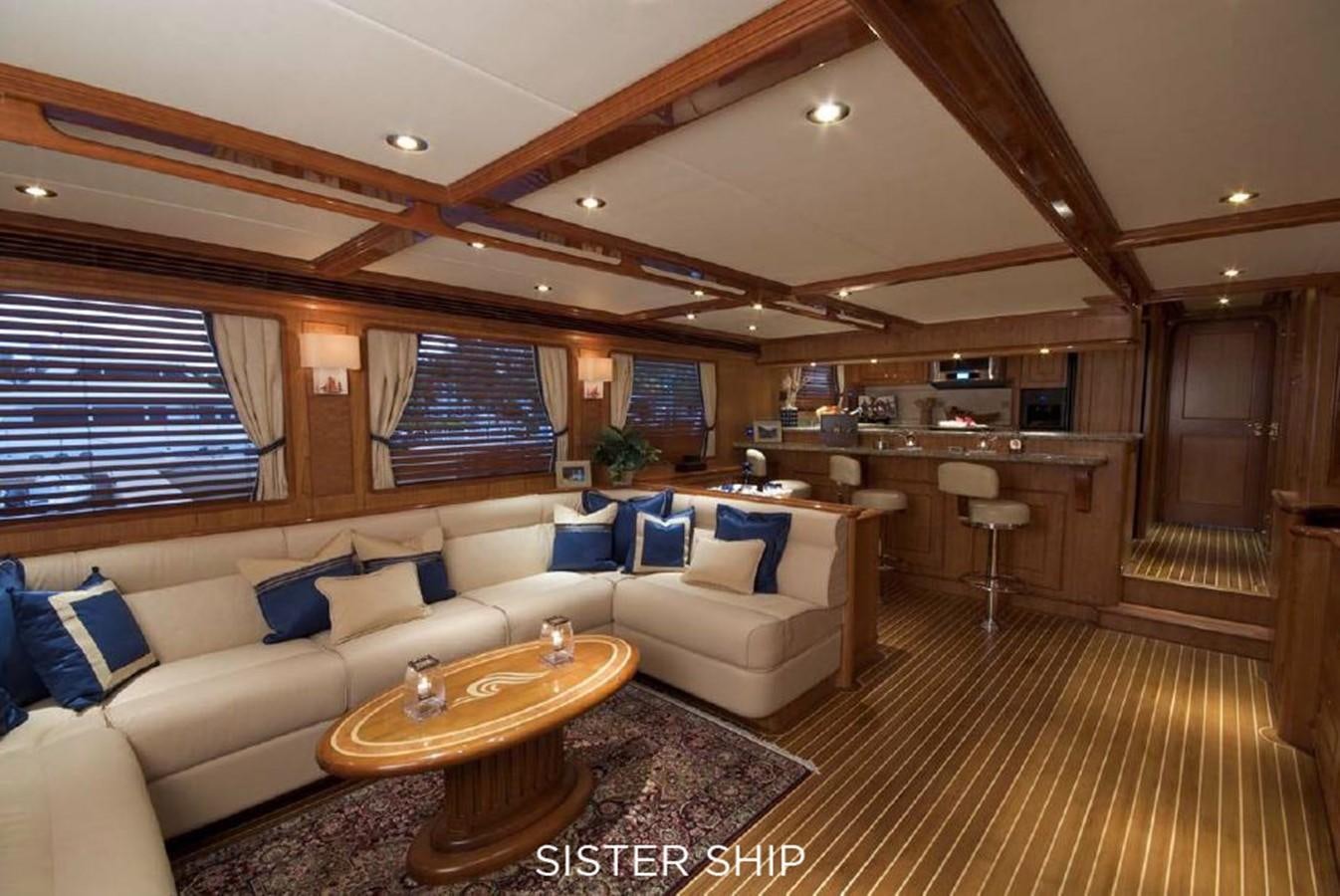 a living room with a couch and a table aboard 800 MY Yacht for Sale
