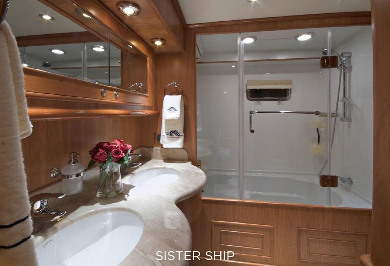 a bathroom with a large mirror aboard 800 MY Yacht for Sale