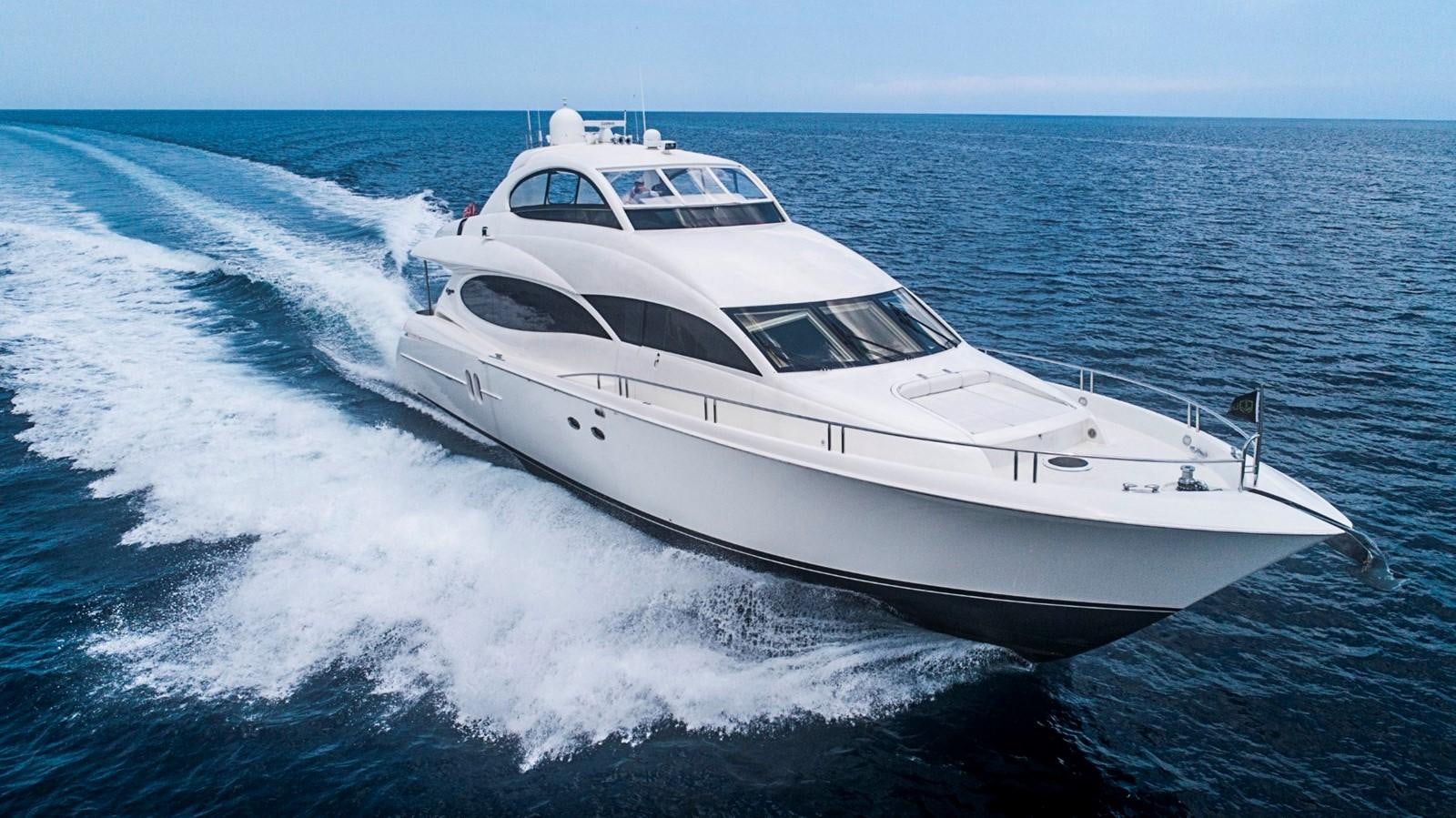 a white yacht on the water aboard RENDEZVOUS Yacht for Sale