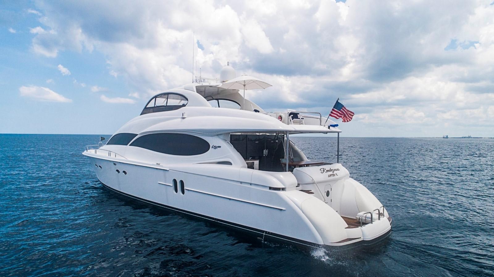 a white yacht in the water aboard RENDEZVOUS Yacht for Sale