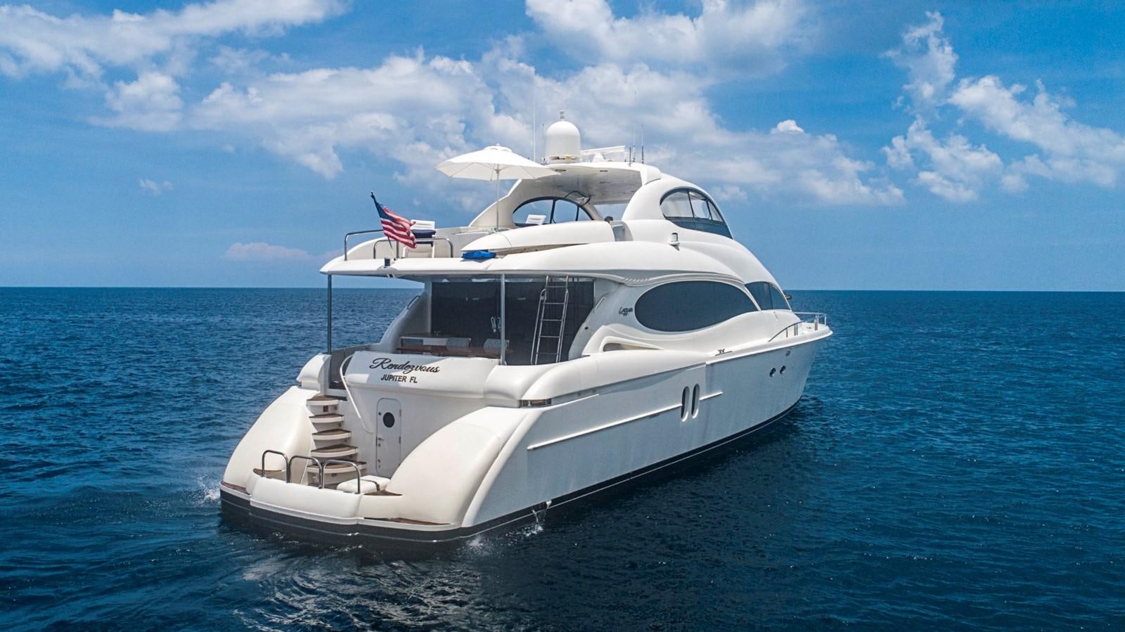 a white yacht in the water aboard RENDEZVOUS Yacht for Sale