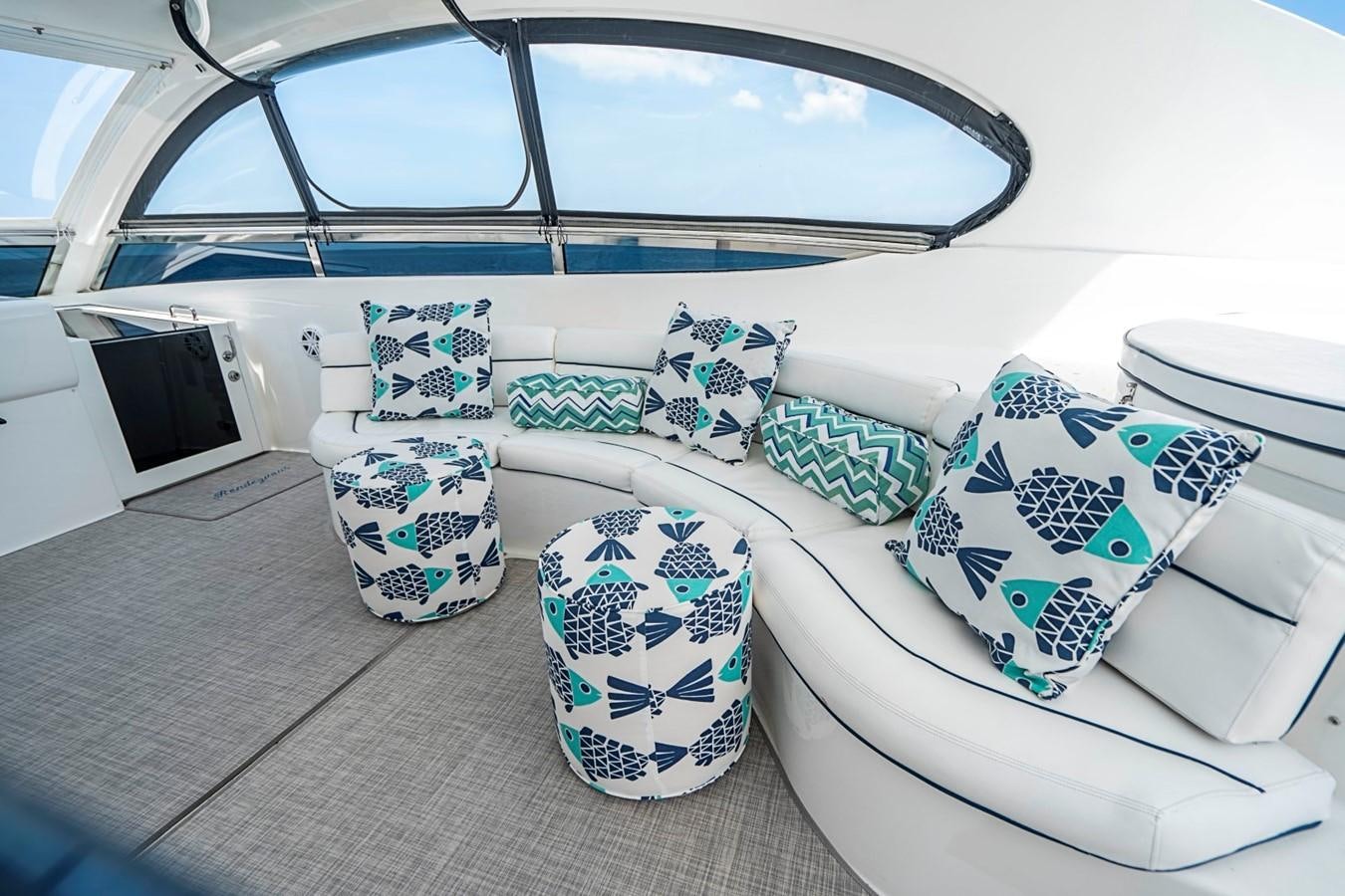 a car with pillows on the front aboard RENDEZVOUS Yacht for Sale