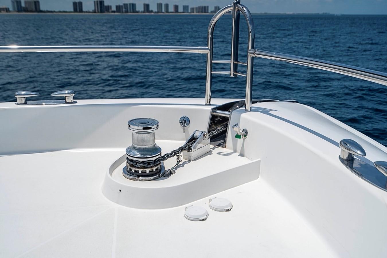 a white sink with a faucet on it aboard RENDEZVOUS Yacht for Sale