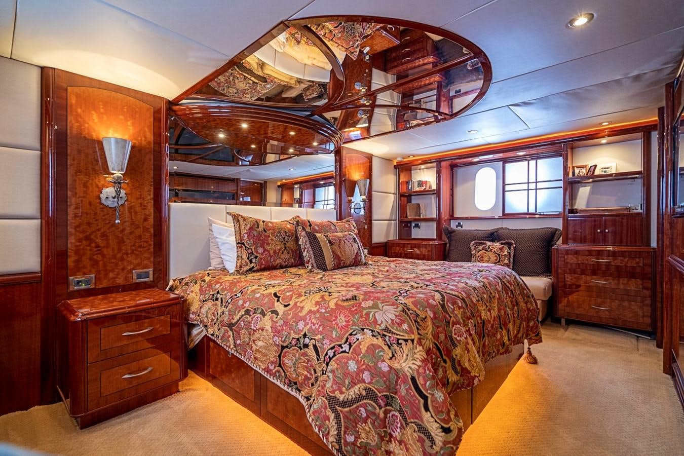 a large bedroom with a large bed aboard RENDEZVOUS Yacht for Sale