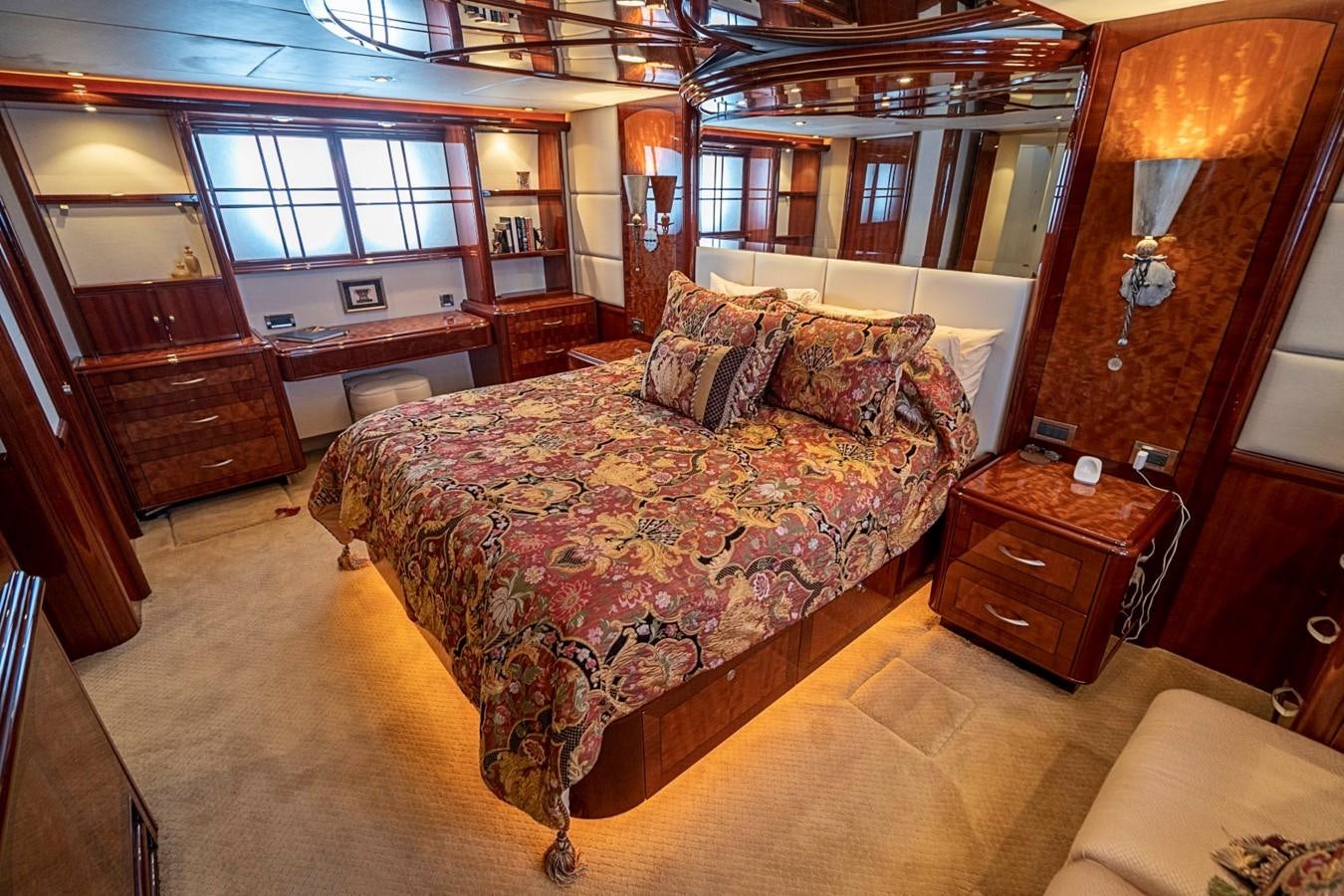 a large bed in a room aboard RENDEZVOUS Yacht for Sale