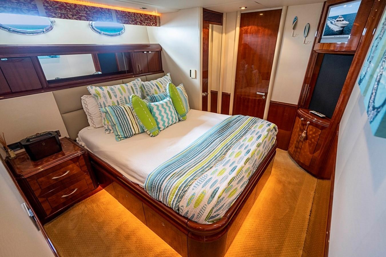 a bed in a room aboard RENDEZVOUS Yacht for Sale