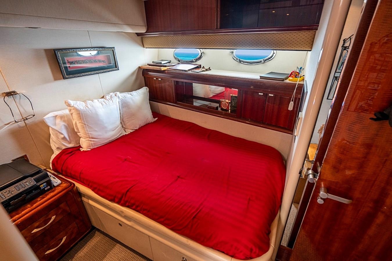 a bed in a room aboard RENDEZVOUS Yacht for Sale