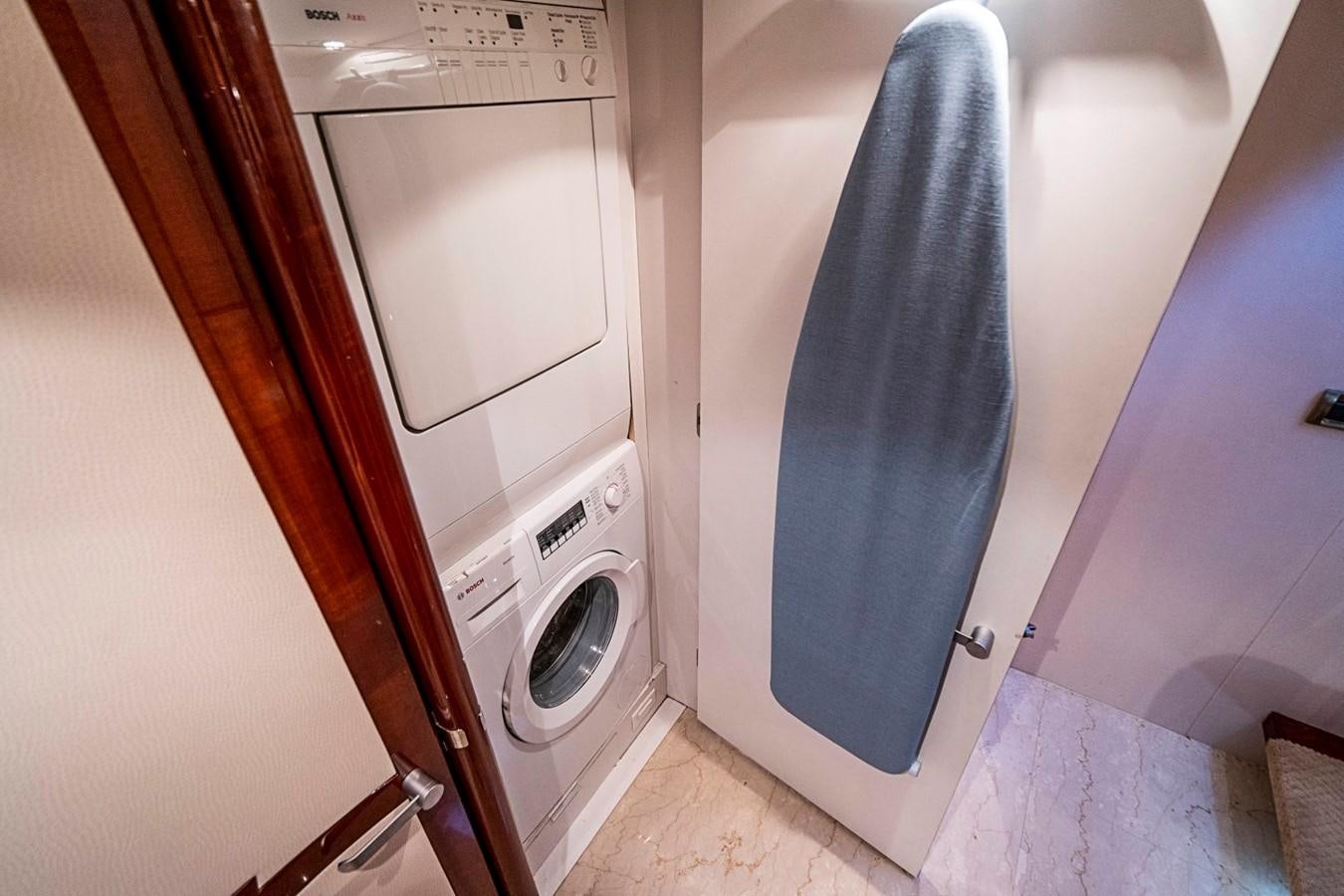 a washing machine in a room aboard RENDEZVOUS Yacht for Sale