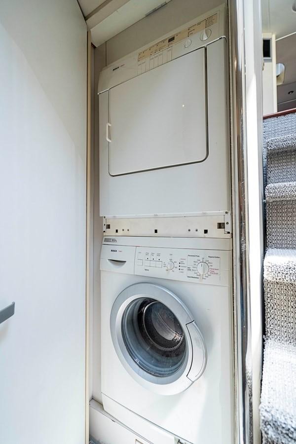 a white washing machine aboard RENDEZVOUS Yacht for Sale