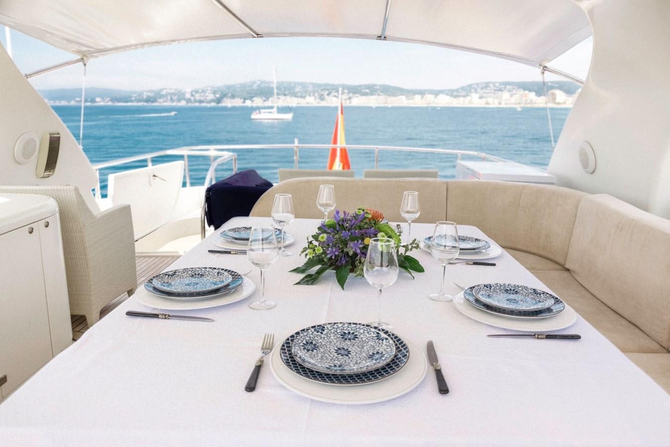 a table set for a dinner aboard ROSIQUE Yacht for Sale