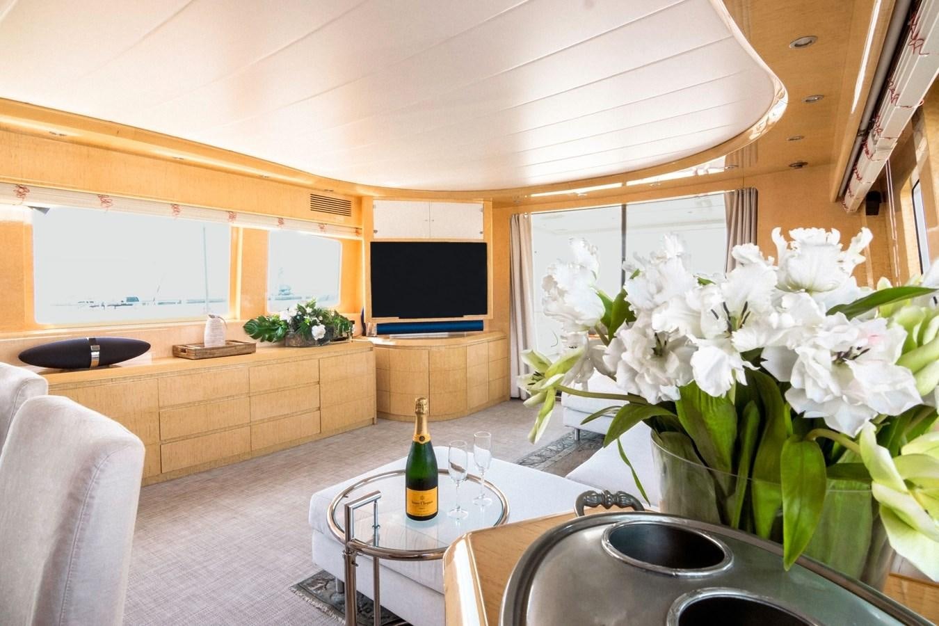 a wine bottle on a table aboard ROSIQUE Yacht for Sale