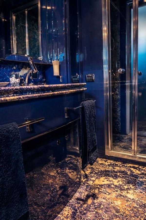 a bathroom with a sink and a mirror aboard ROSIQUE Yacht for Sale