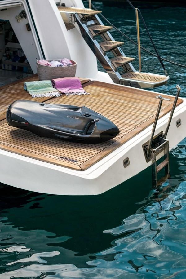 a boat with a paddle on the water aboard ROSIQUE Yacht for Sale