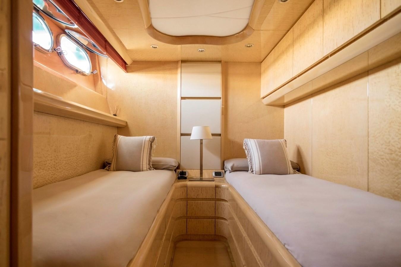 a room with two beds aboard ROSIQUE Yacht for Sale